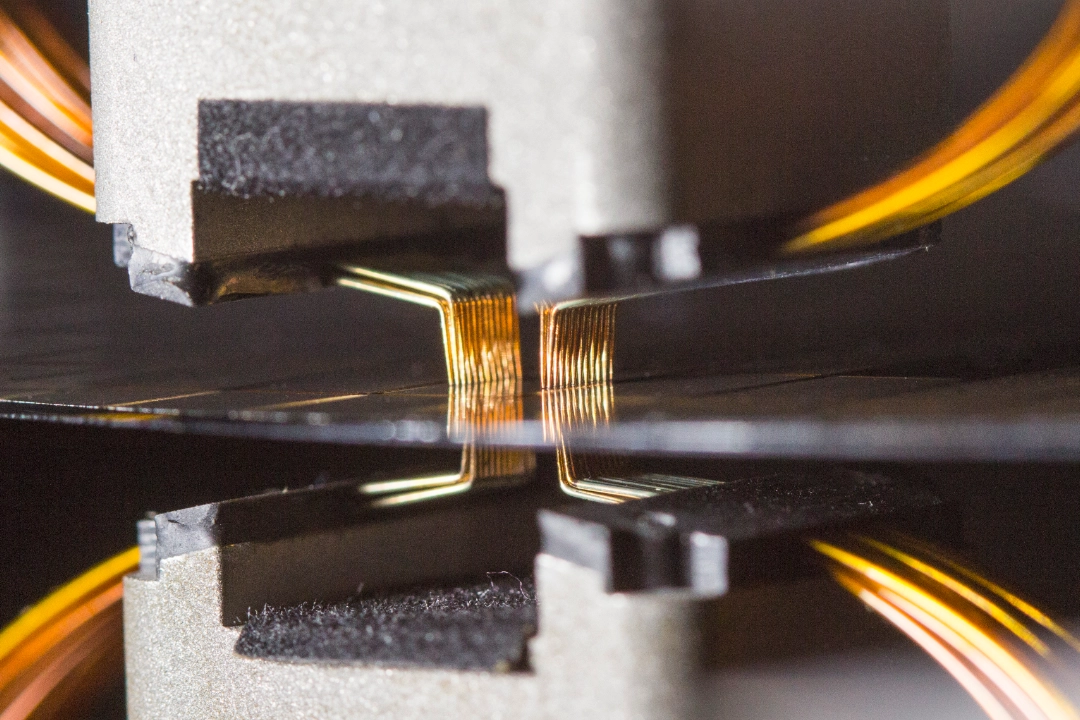 imultaneous probing on both sides of a wafer, through flying probe cards on a SPEA TH2000 prober.